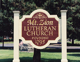 carved church sign
