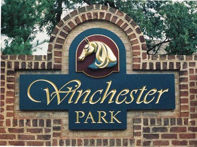 carved entrance sign